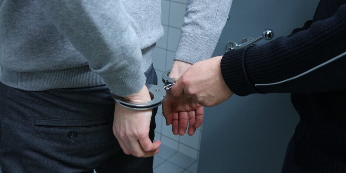 Two Former Employees Arrested