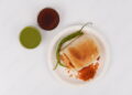 Mumbai's Vadapav In plate With Green Chutney and imli [tamarind] Chutney