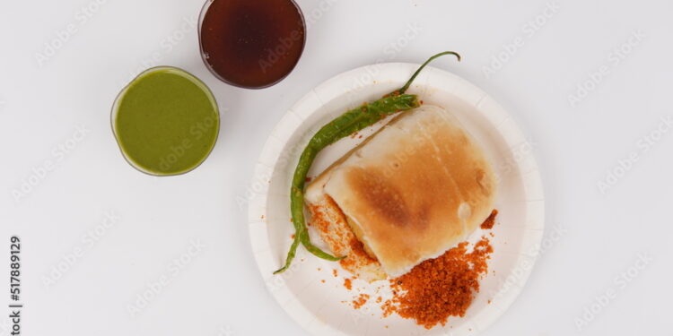 Mumbai's Vadapav In plate With Green Chutney and imli [tamarind] Chutney