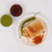 Mumbai's Vadapav In plate With Green Chutney and imli [tamarind] Chutney